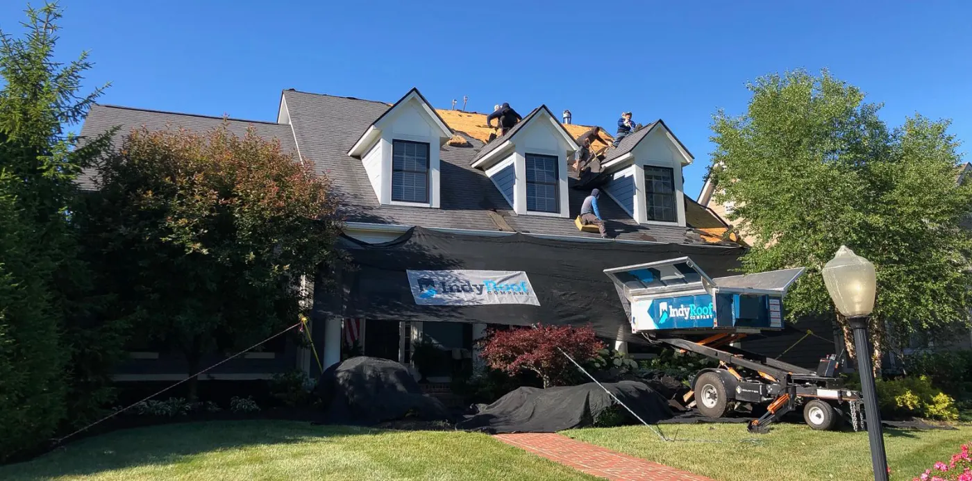 Tarping and dry-in on a Spyglass Falls commercial roof