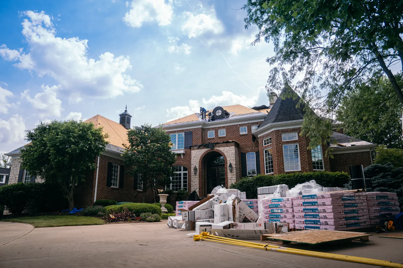 Tarping and dry-in on a Spyglass Falls commercial roof